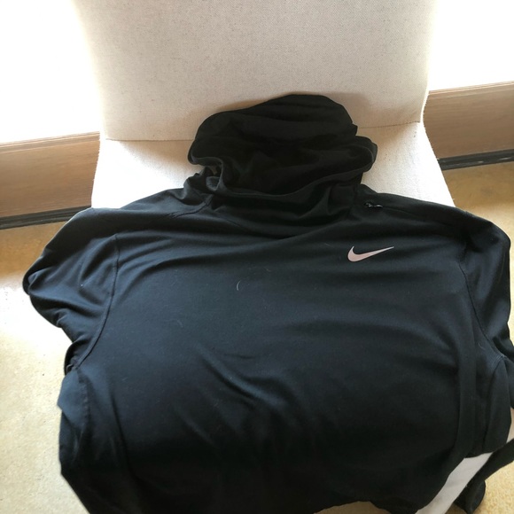 A Nike pull over with hood zippers and thumb holes - Picture 2 of 6